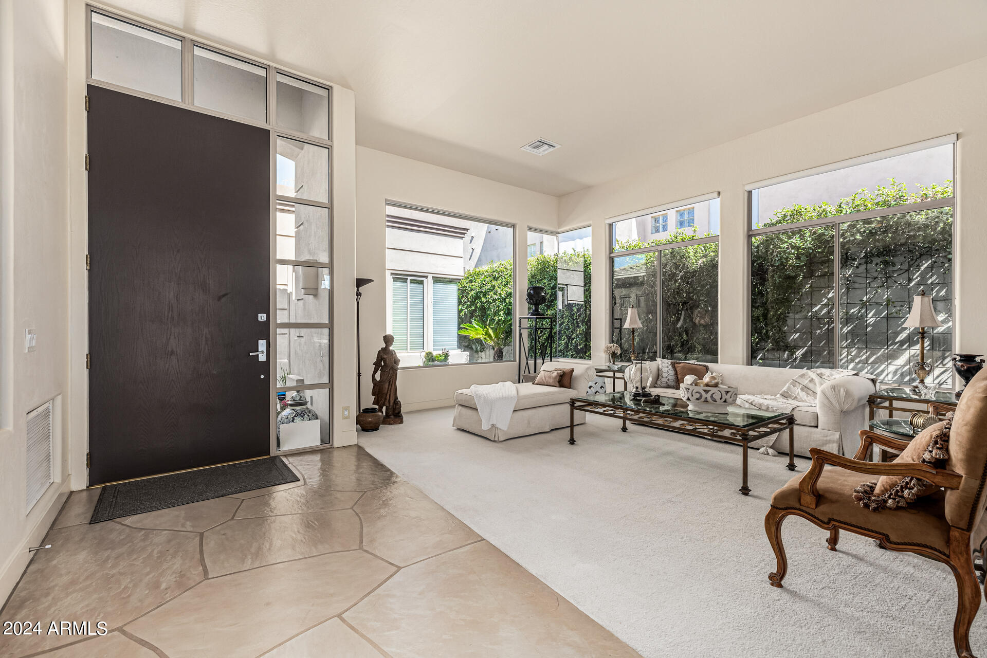 6437 North 28th Street Phoenix, AZ 85016 - Photo 5 of 53 a living room with furniture and a large window
