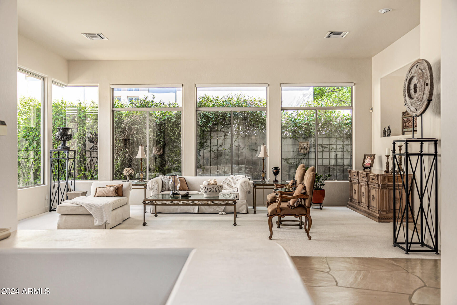6437 North 28th Street Phoenix, AZ 85016 - Photo 8 of 53 a living room with furniture and large windows