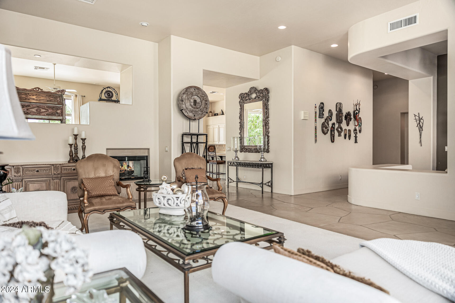 6437 North 28th Street Phoenix, AZ 85016 - Photo 9 of 53 a living room with furniture kitchen and a table