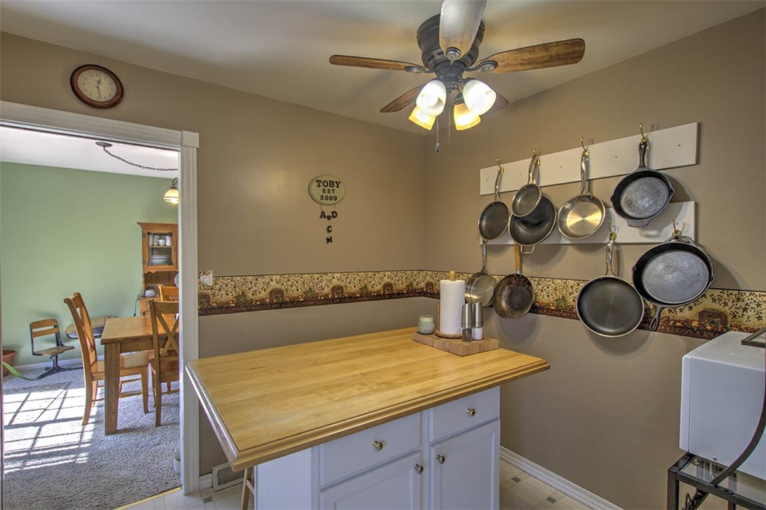 120 Point Bluff Drive Decatur, IL 62521 - Photo 10 of 34 a view of a room that has a table and chairs