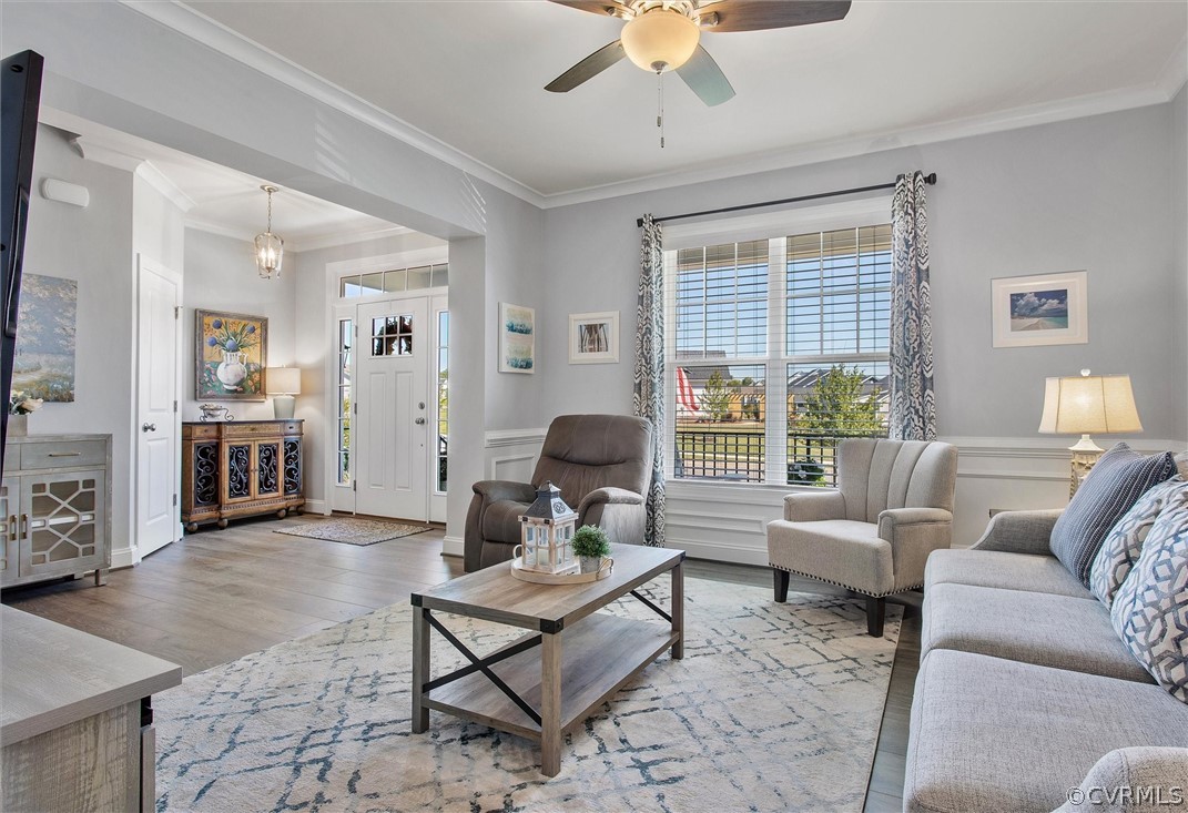 12233 Bremner Ridge Circle Manakin-Sabot, VA 23103 - Photo 20 of 49 a living room with furniture and a large window