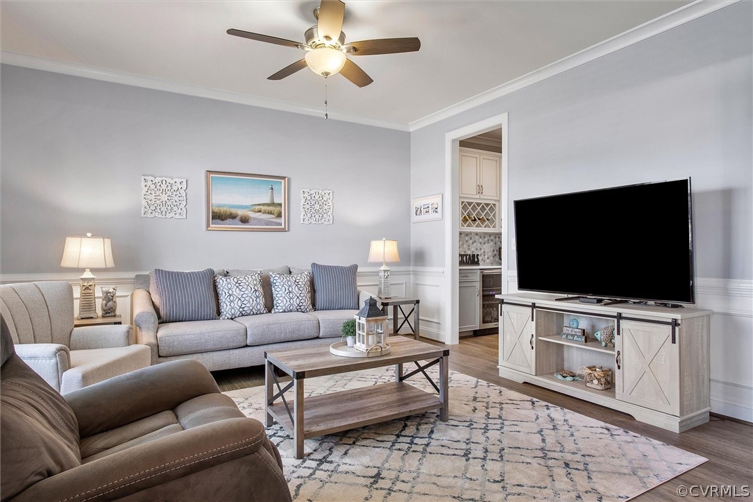 12233 Bremner Ridge Circle Manakin-Sabot, VA 23103 - Photo 21 of 49 a living room with furniture and a flat screen tv