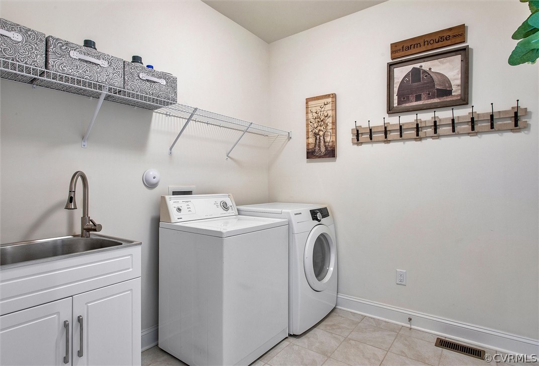 12233 Bremner Ridge Circle Manakin-Sabot, VA 23103 - Photo 25 of 49 a utility room with dryer and washer
