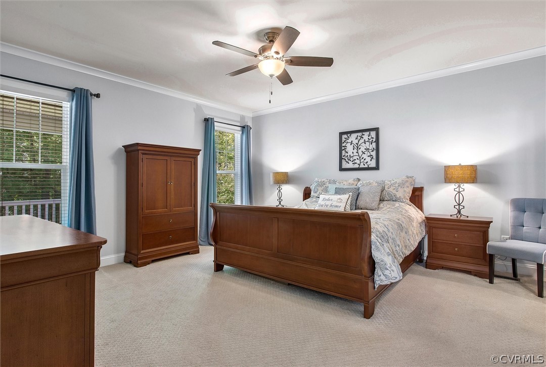 12233 Bremner Ridge Circle Manakin-Sabot, VA 23103 - Photo 26 of 49 a bed room with a bed and a chandelier