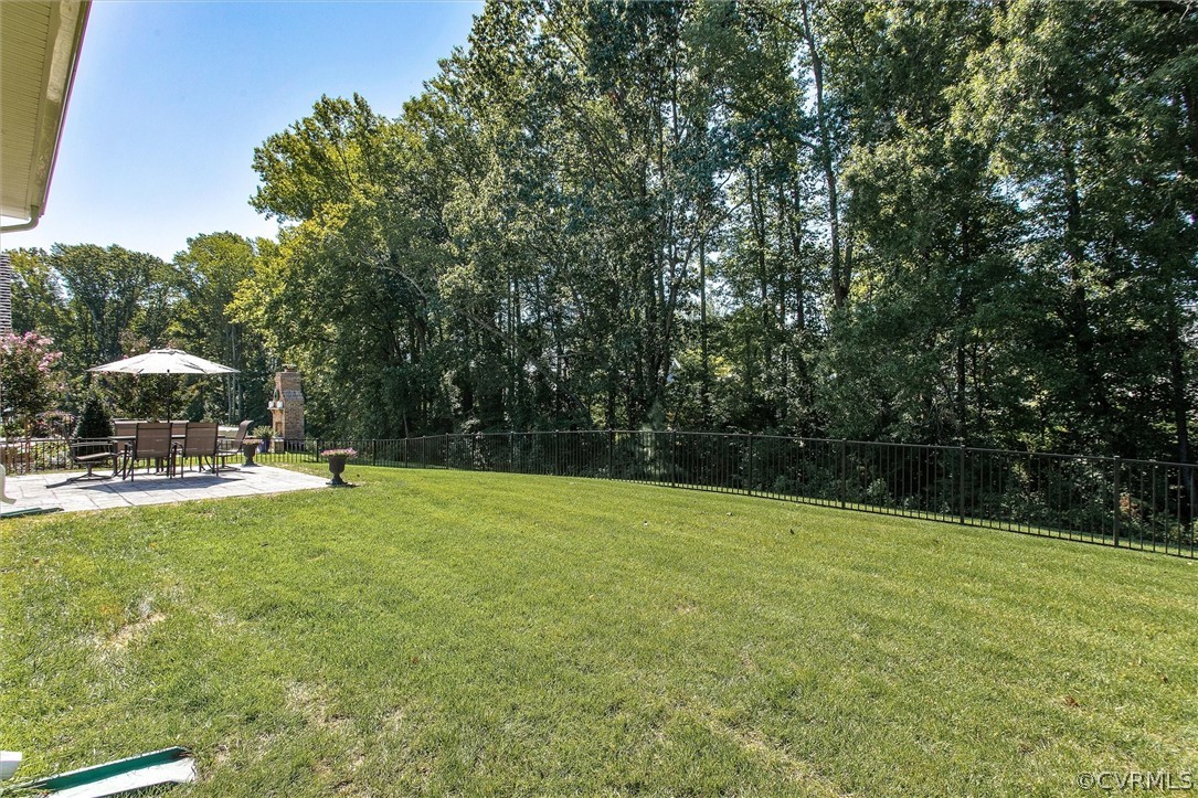 12233 Bremner Ridge Circle Manakin-Sabot, VA 23103 - Photo 40 of 49 a view of a swimming pool and lounge chairs