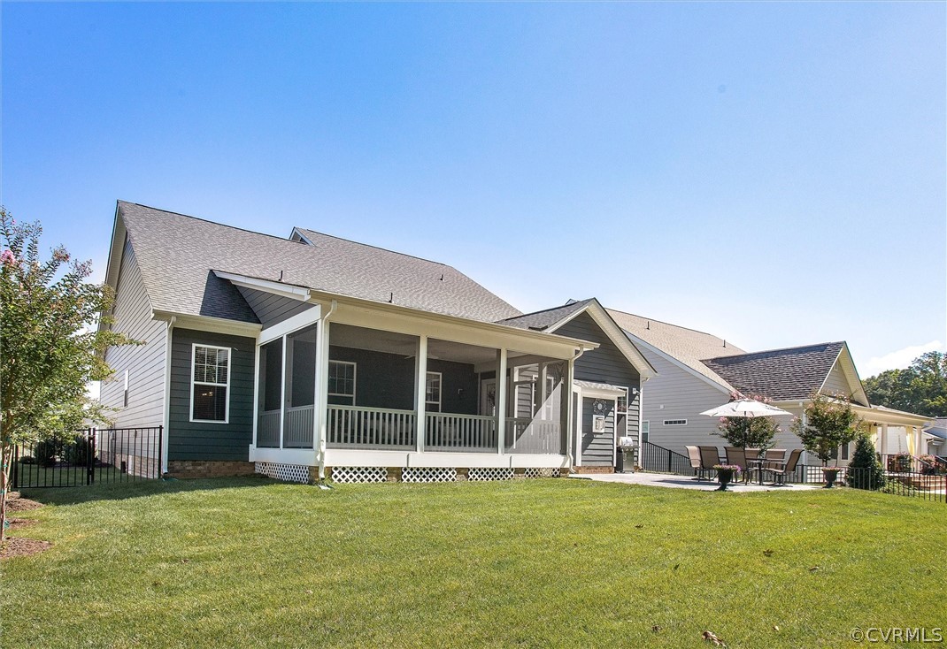 12233 Bremner Ridge Circle Manakin-Sabot, VA 23103 - Photo 41 of 49 a view of a house with a big yard and large trees