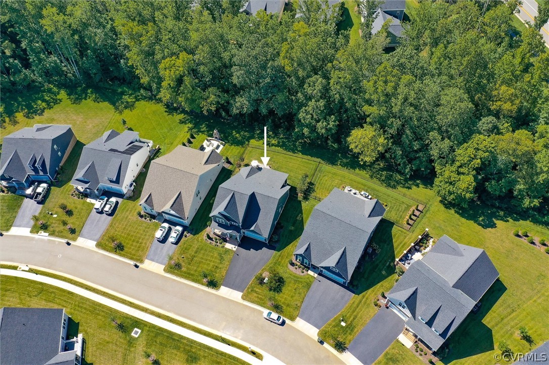 12233 Bremner Ridge Circle Manakin-Sabot, VA 23103 - Photo 42 of 49 an aerial view of residential houses with outdoor space and swimming pool