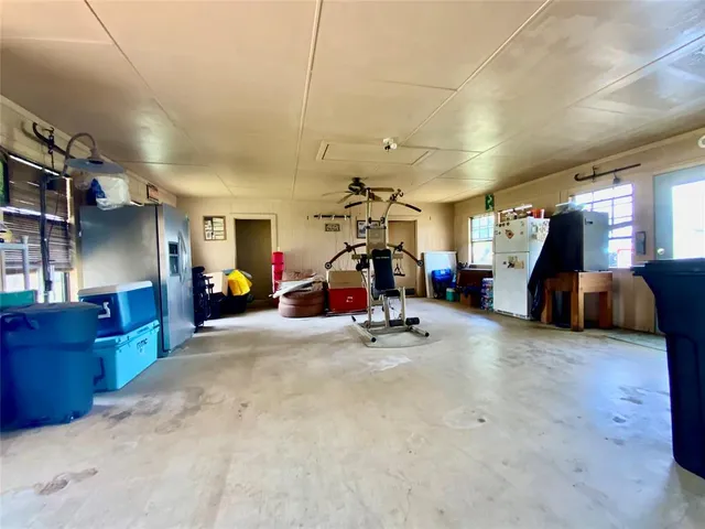 a view of a garage with furniture