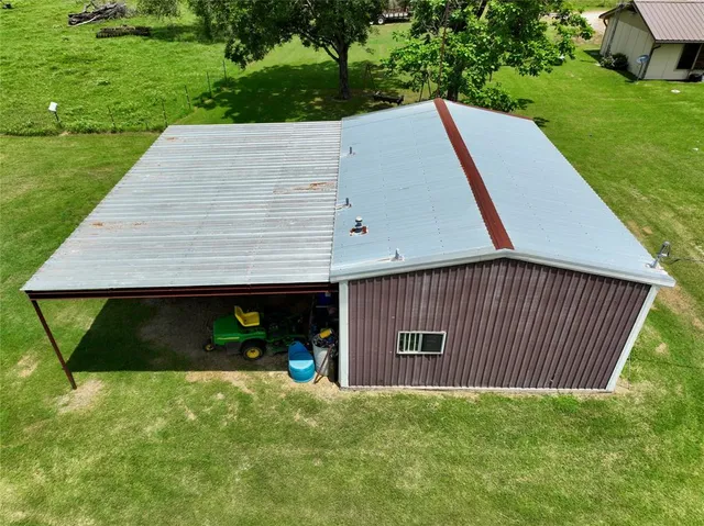 a backyard of a house with lots of green space
