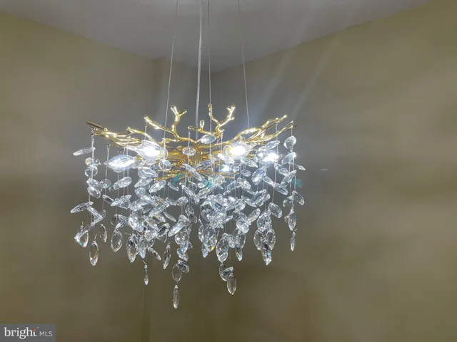 a vase of white flowers sitting on a table