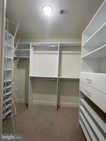 a view of an empty walk in closet