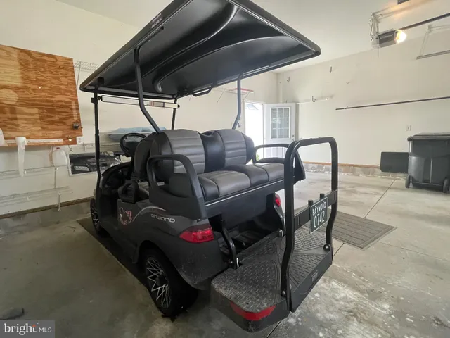 a view of a brick house with a chairs
