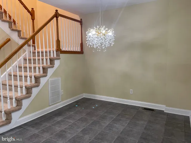 a view of entryway with stairs