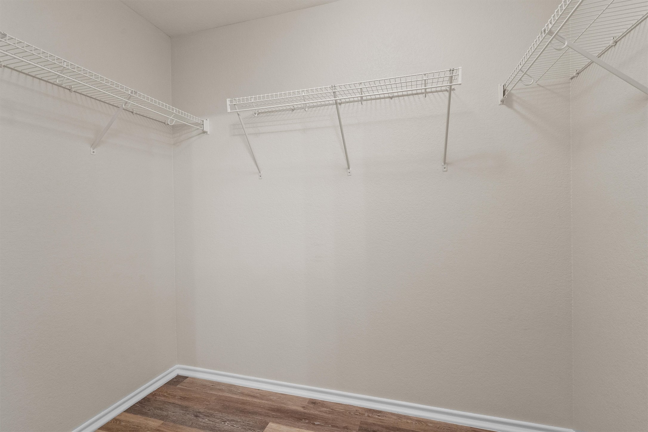 5825 Silver Screen Drive Austin, TX 78747 - Photo 18 of 40 Functional wire shelving provides ample storage solutions within this well-appointed closet.