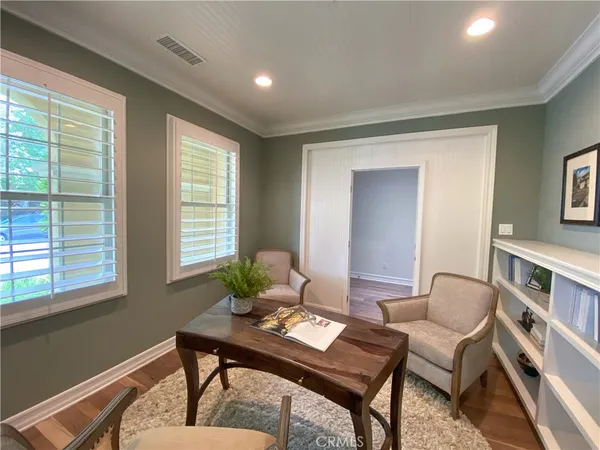 a workspace with furniture and a window