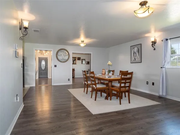 a kitchen with a sink stainless steel appliances and cabinets