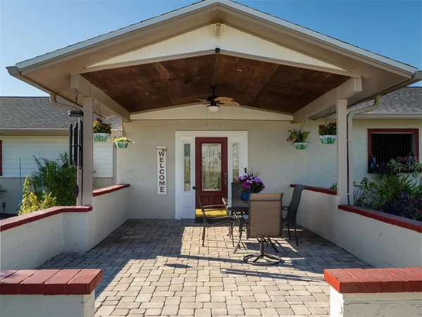 a view of a livingroom with furniture and hardwood floor