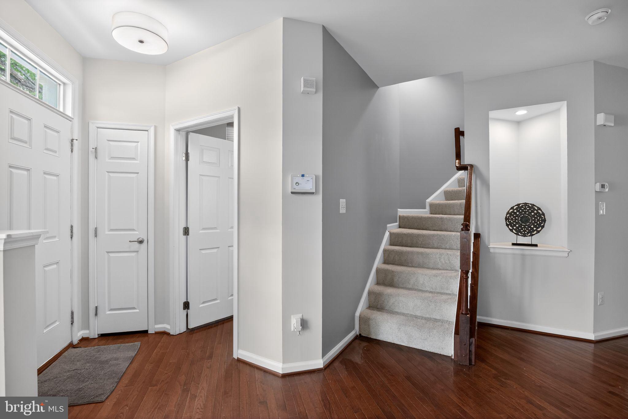 2624 St Marys View Road Accokeek, MD 20607 - Photo 13 of 31 a view of a hallway with wooden floor and entryway