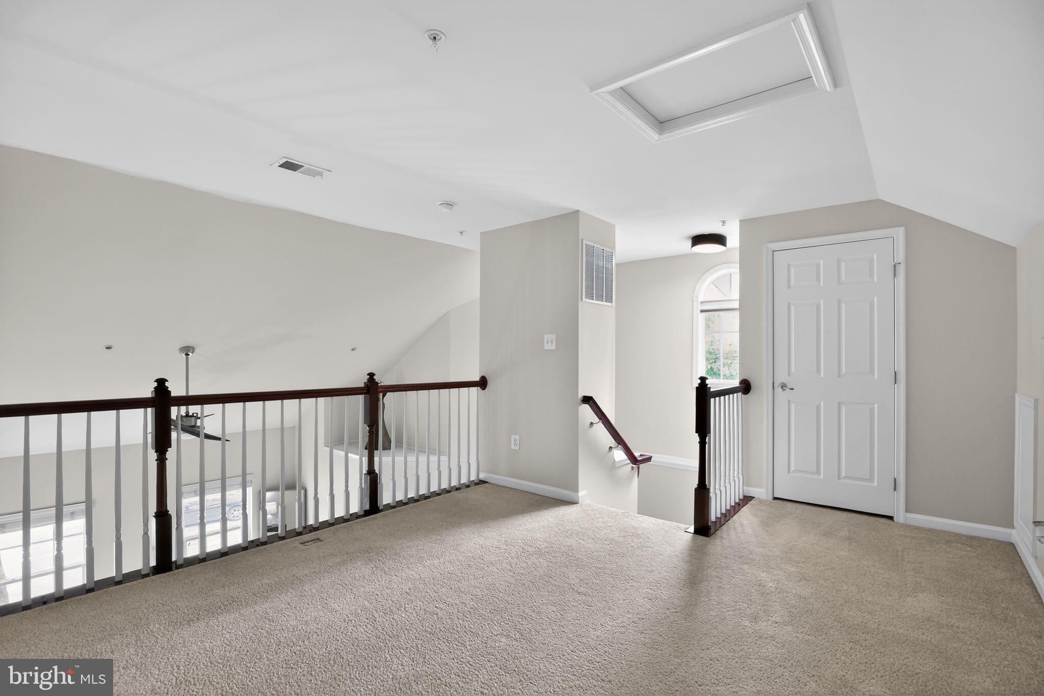 2624 St Marys View Road Accokeek, MD 20607 - Photo 17 of 31 a view of a hallway with staircase