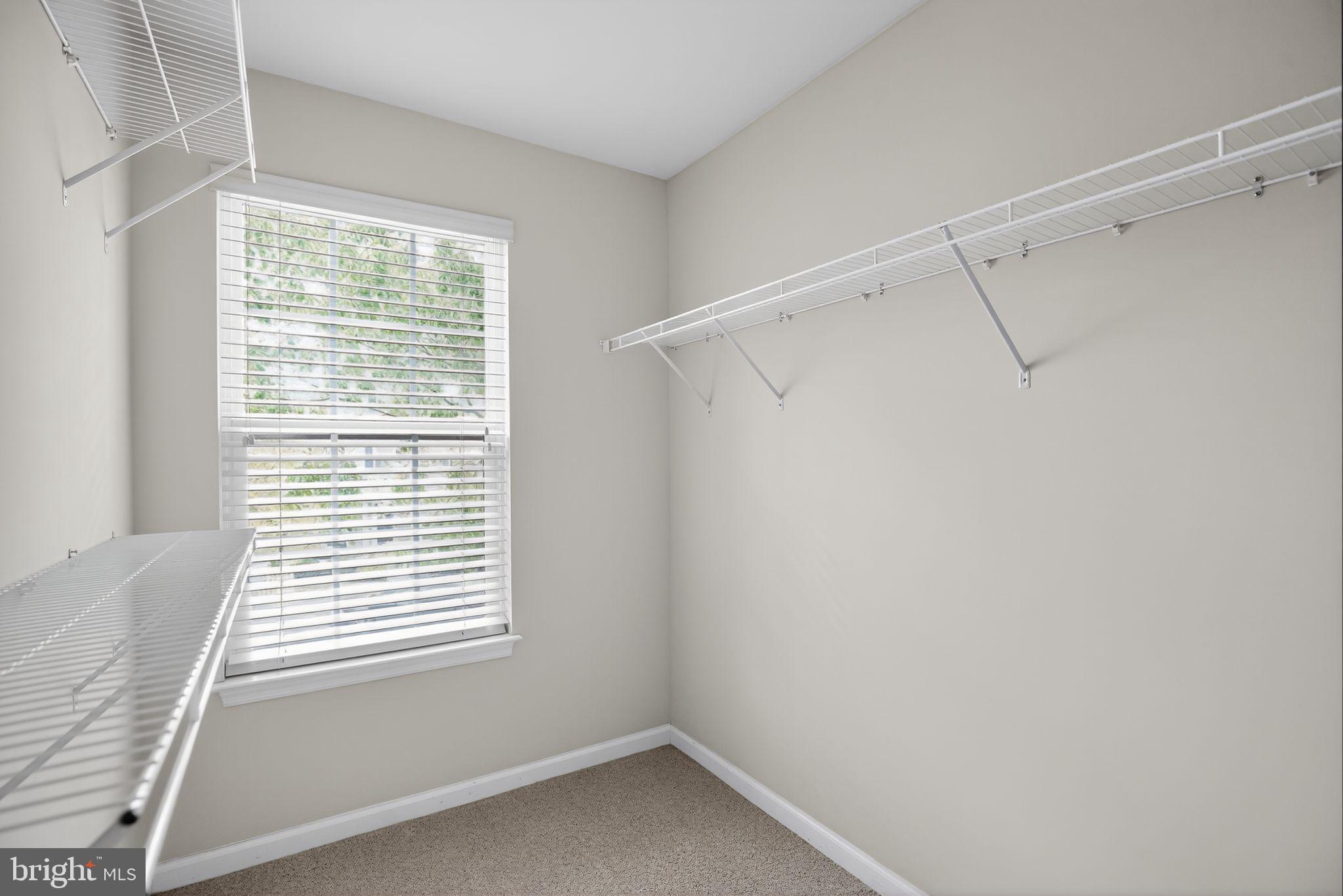 2624 St Marys View Road Accokeek, MD 20607 - Photo 20 of 31 a small space with a window and a ceiling fan