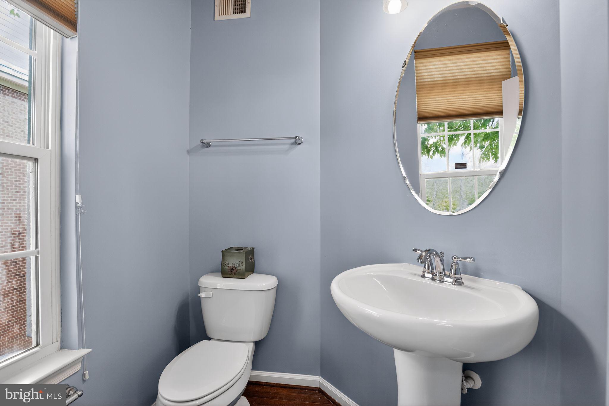 2624 St Marys View Road Accokeek, MD 20607 - Photo 27 of 31 a bathroom with a toilet sink and mirror
