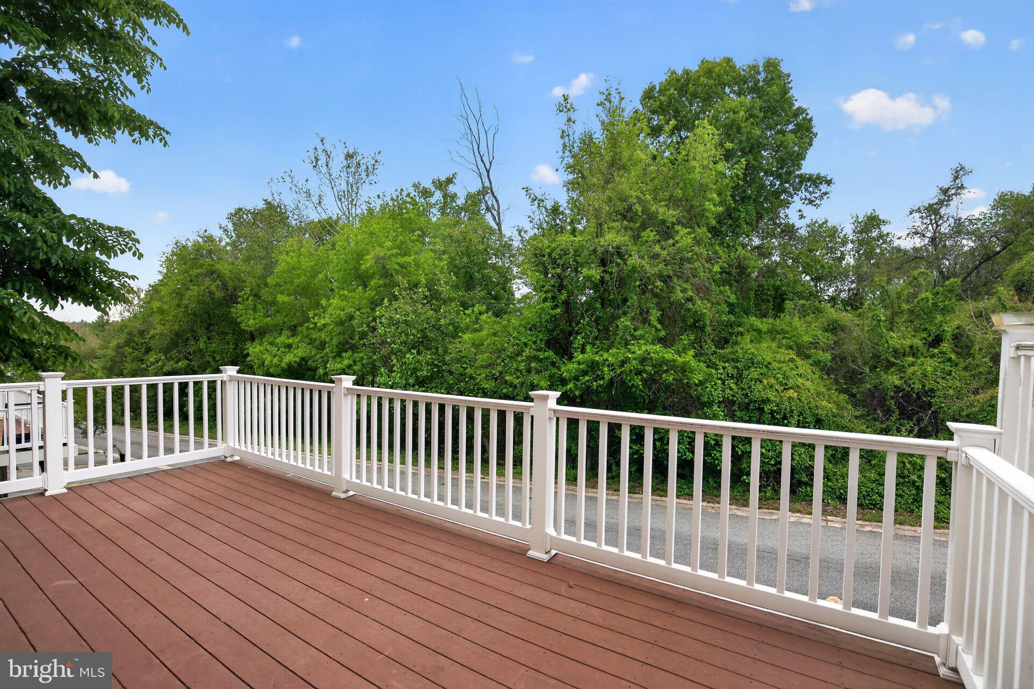 2624 St Marys View Road Accokeek, MD 20607 - Photo 29 of 31 a balcony with wooden floor and fence