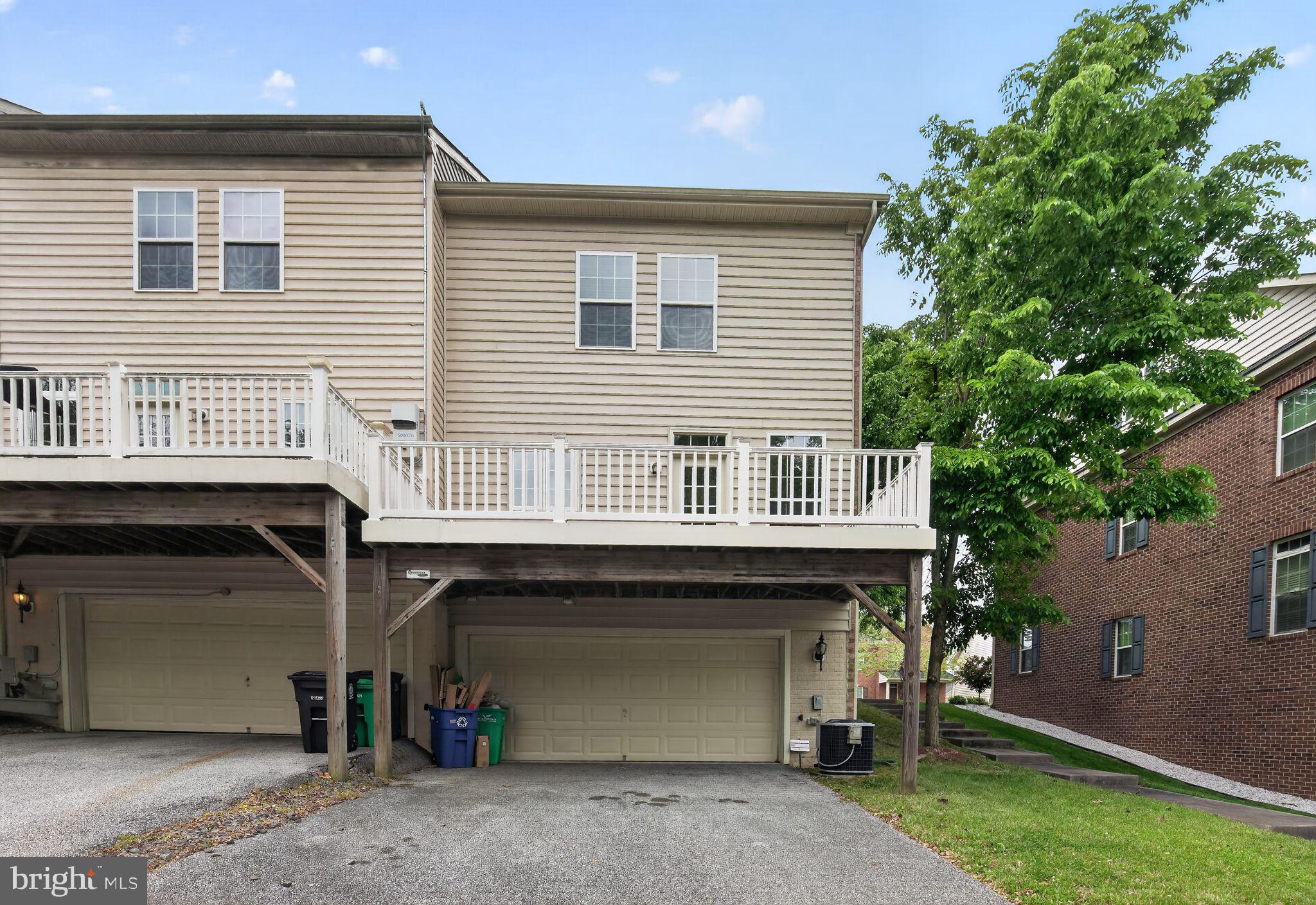 2624 St Marys View Road Accokeek, MD 20607 - Photo 30 of 31 a view of a house with a balcony and a garage