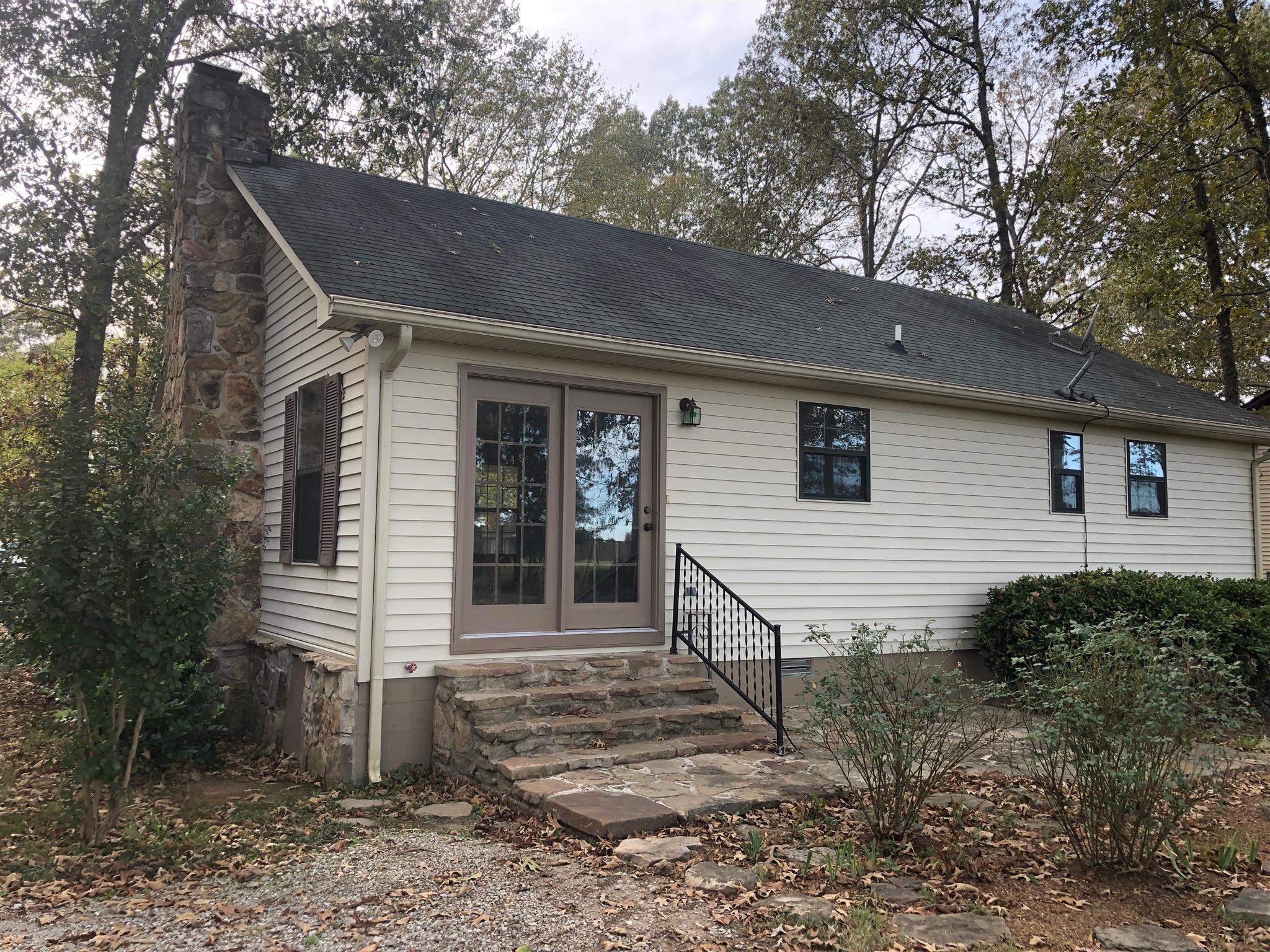 246 Leslie Jamie Road Manchester, TN 37355 - Photo 19 of 23 Back of the home has rock stairs and rock patio!