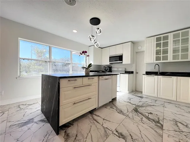 a view of wooden floor in an empty room