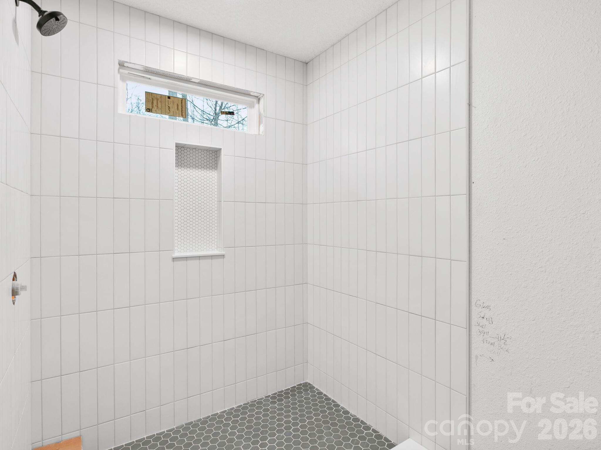 10 Bear Trail Fairview, NC 28730 - Photo 19 of 29 a bathroom with a shower