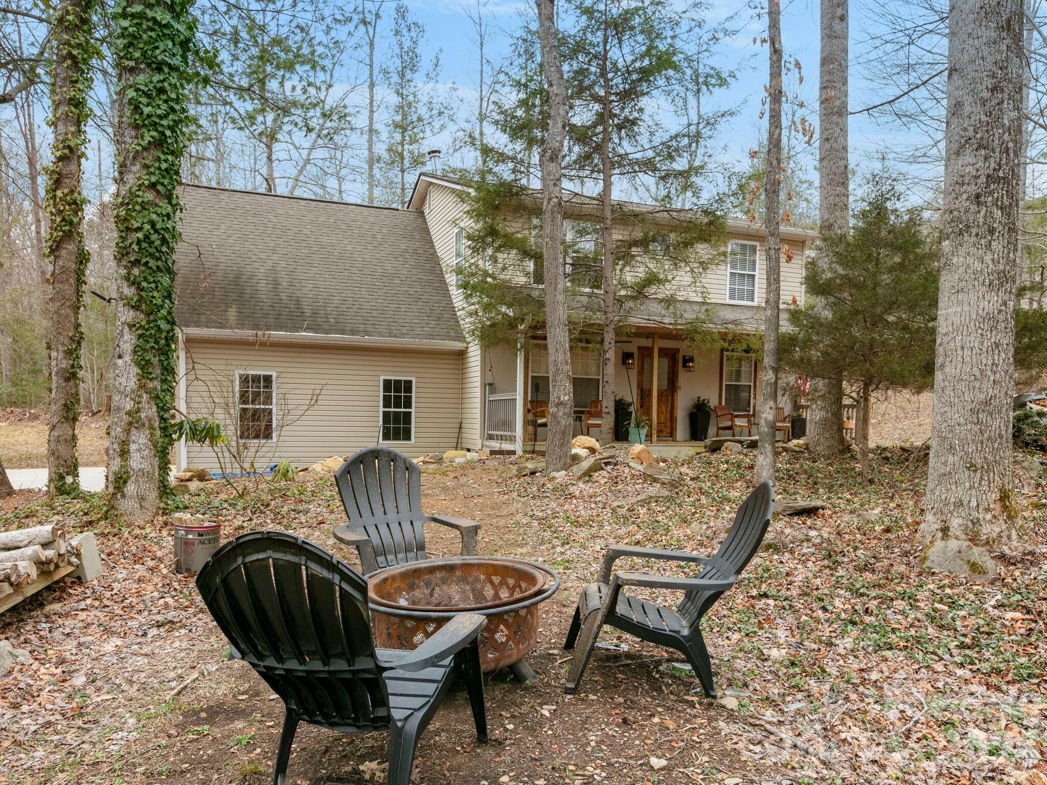 10 Bear Trail Fairview, NC 28730 - Photo 2 of 29 a view of house with backyard and outdoor seating