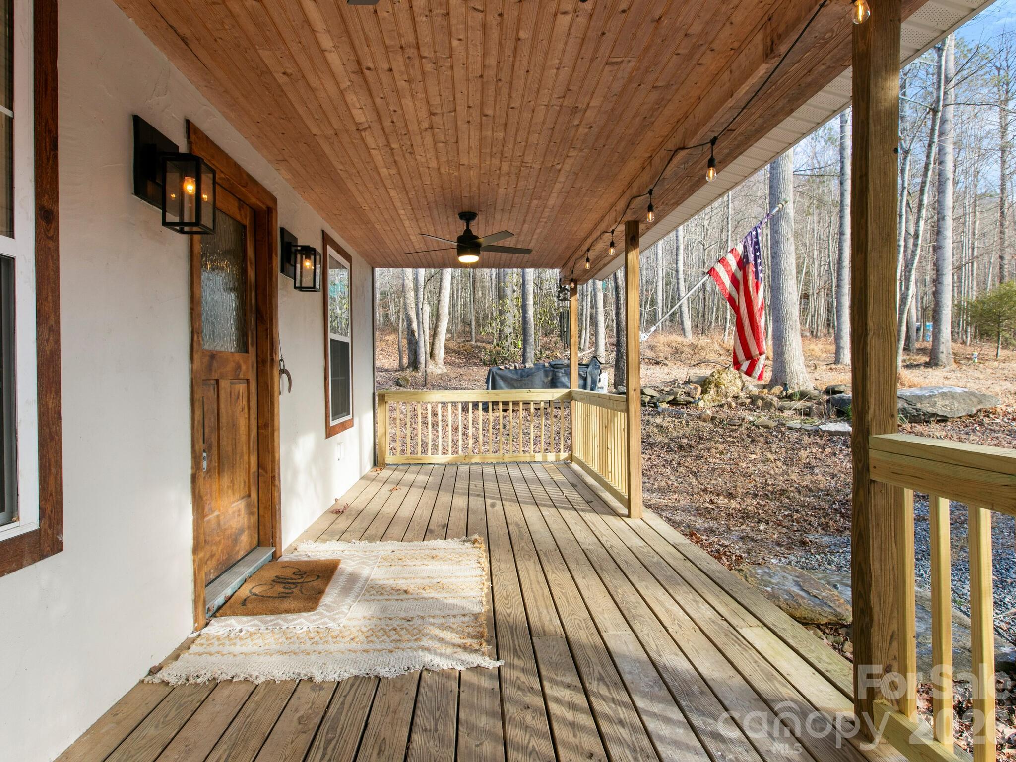 10 Bear Trail Fairview, NC 28730 - Photo 27 of 29 a view of a balcony with wooden floor and outdoor space