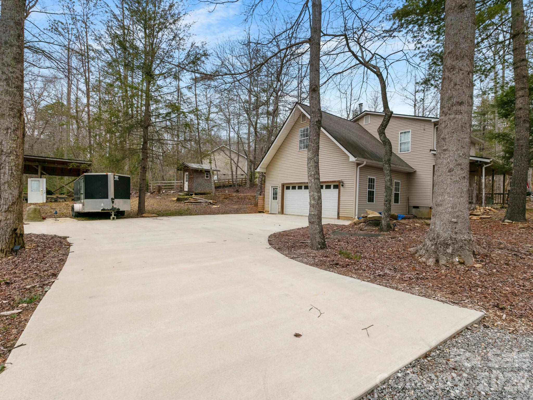 10 Bear Trail Fairview, NC 28730 - Photo 29 of 29 a view of a house with a yard covered in snow
