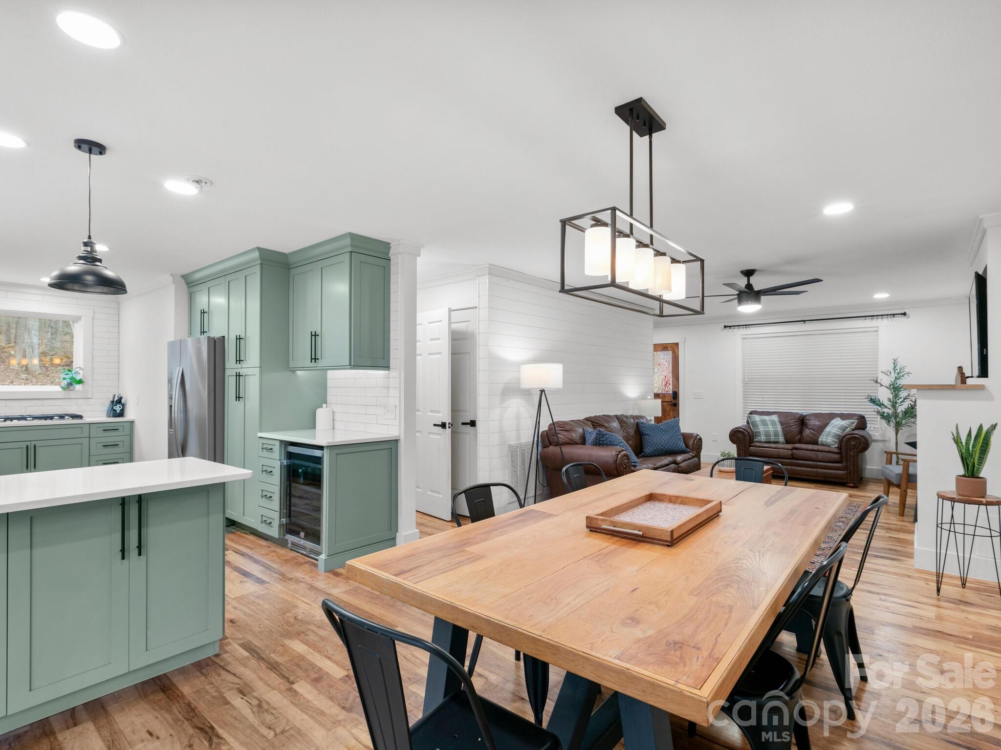 10 Bear Trail Fairview, NC 28730 - Photo 5 of 29 a large kitchen with a table and chairs