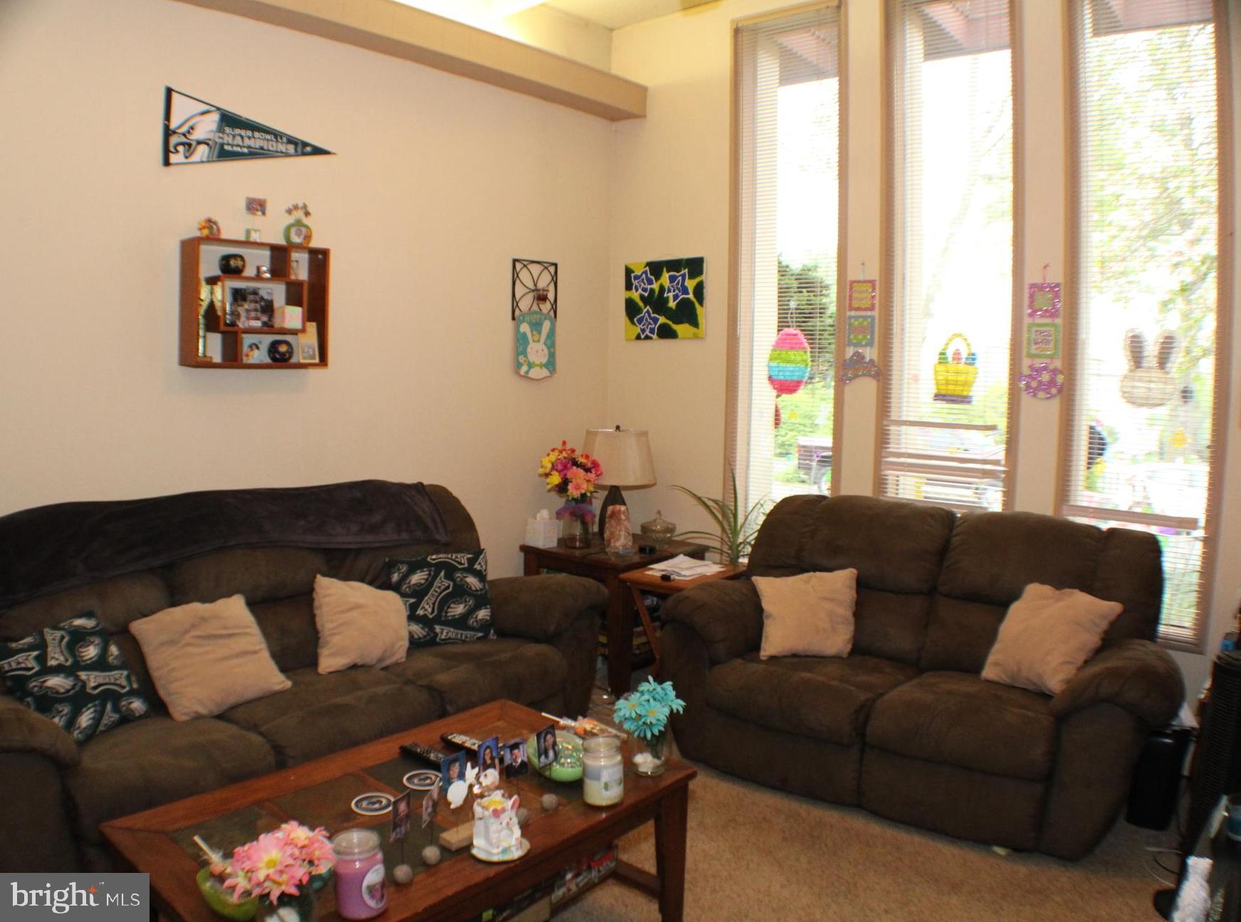 Living room with vaulted ceiling
