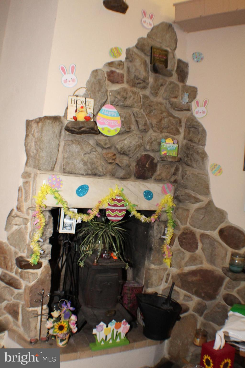 Stone wall wood burning stove