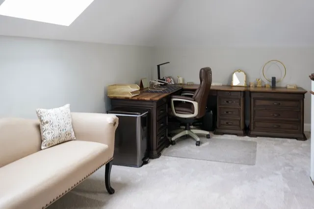 a living room with furniture and window