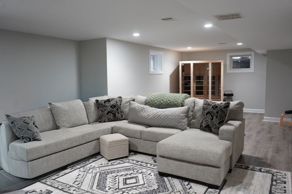 242 Valley Road Needham, MA 02492 - Photo 23 of 24 a living room with furniture and window