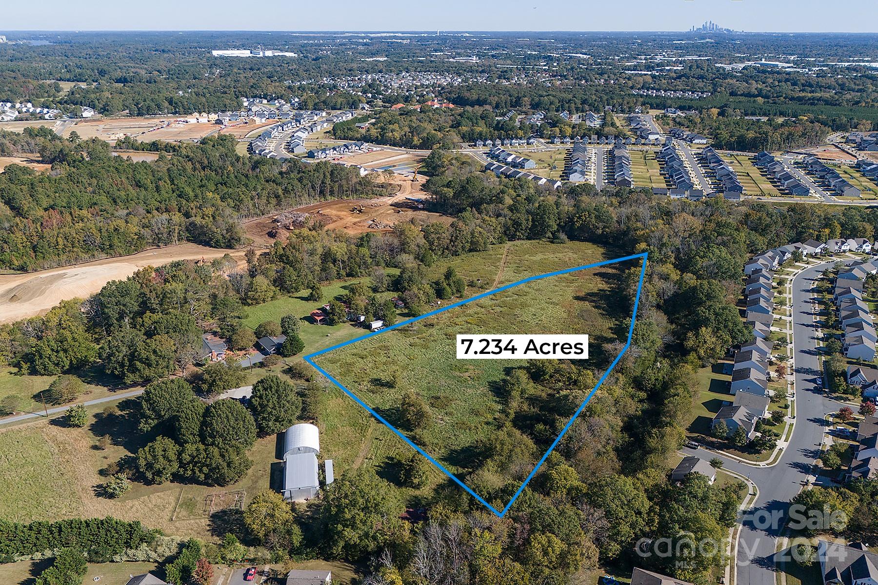 15207 Shopton Road West Charlotte, NC 28278 - Photo 6 of 15 an aerial view of residential houses with outdoor space and parking