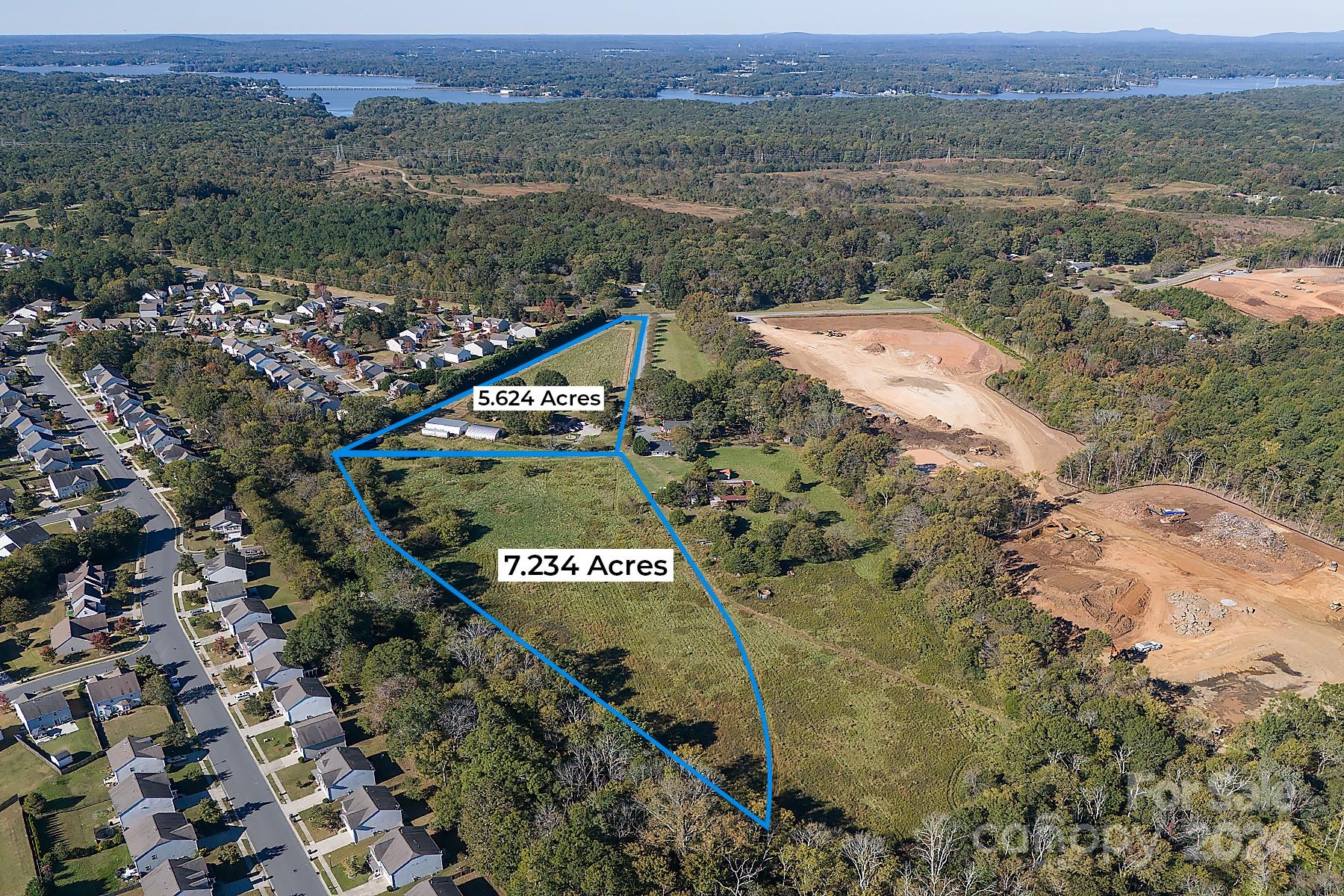 15207 Shopton Road West Charlotte, NC 28278 - Photo 9 of 15 an aerial view of a forest with houses