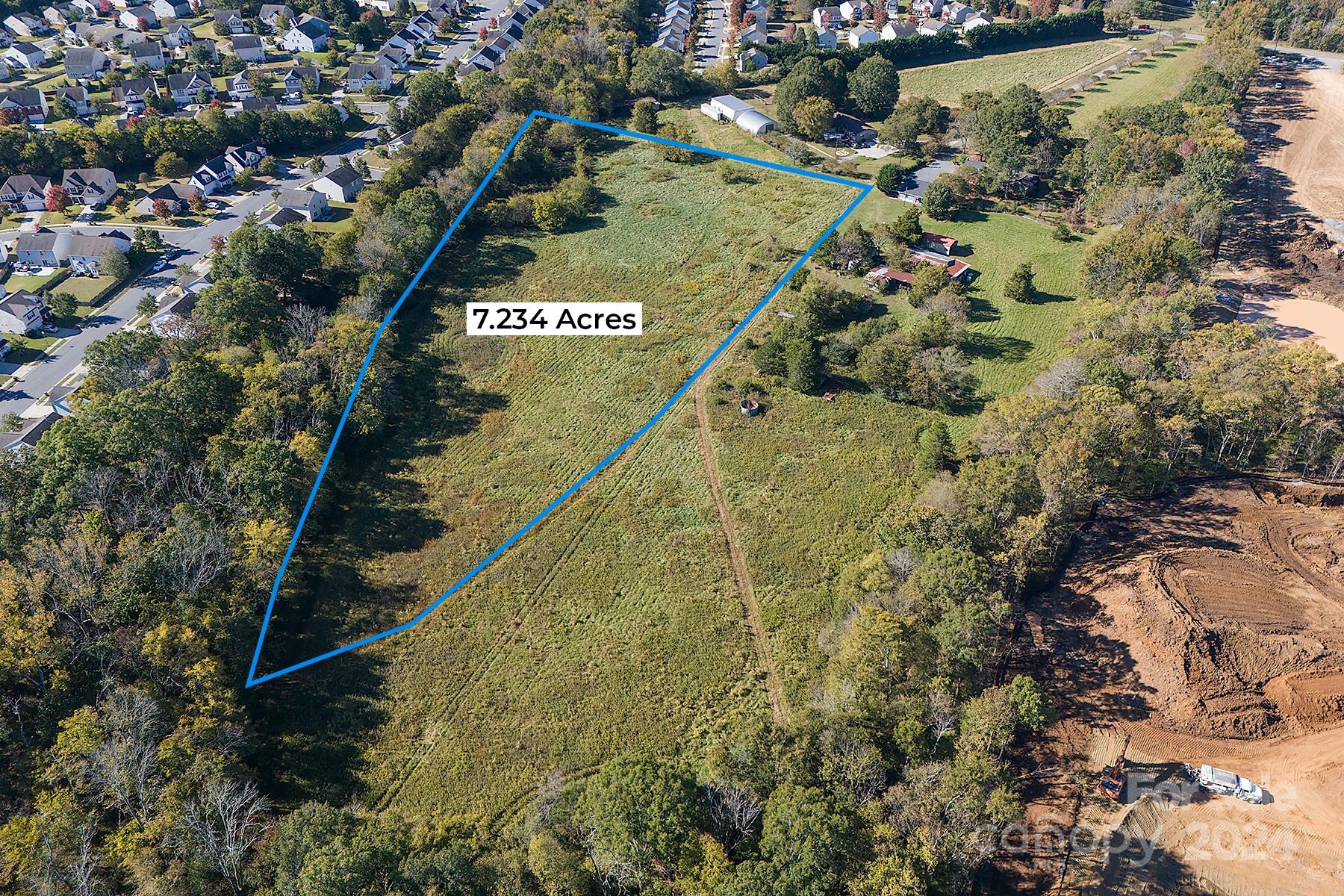 15207 Shopton Road West Charlotte, NC 28278 - Photo 10 of 15 an aerial view of residential houses with outdoor space