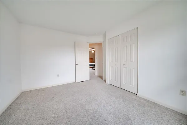 a view of hallway with stairs