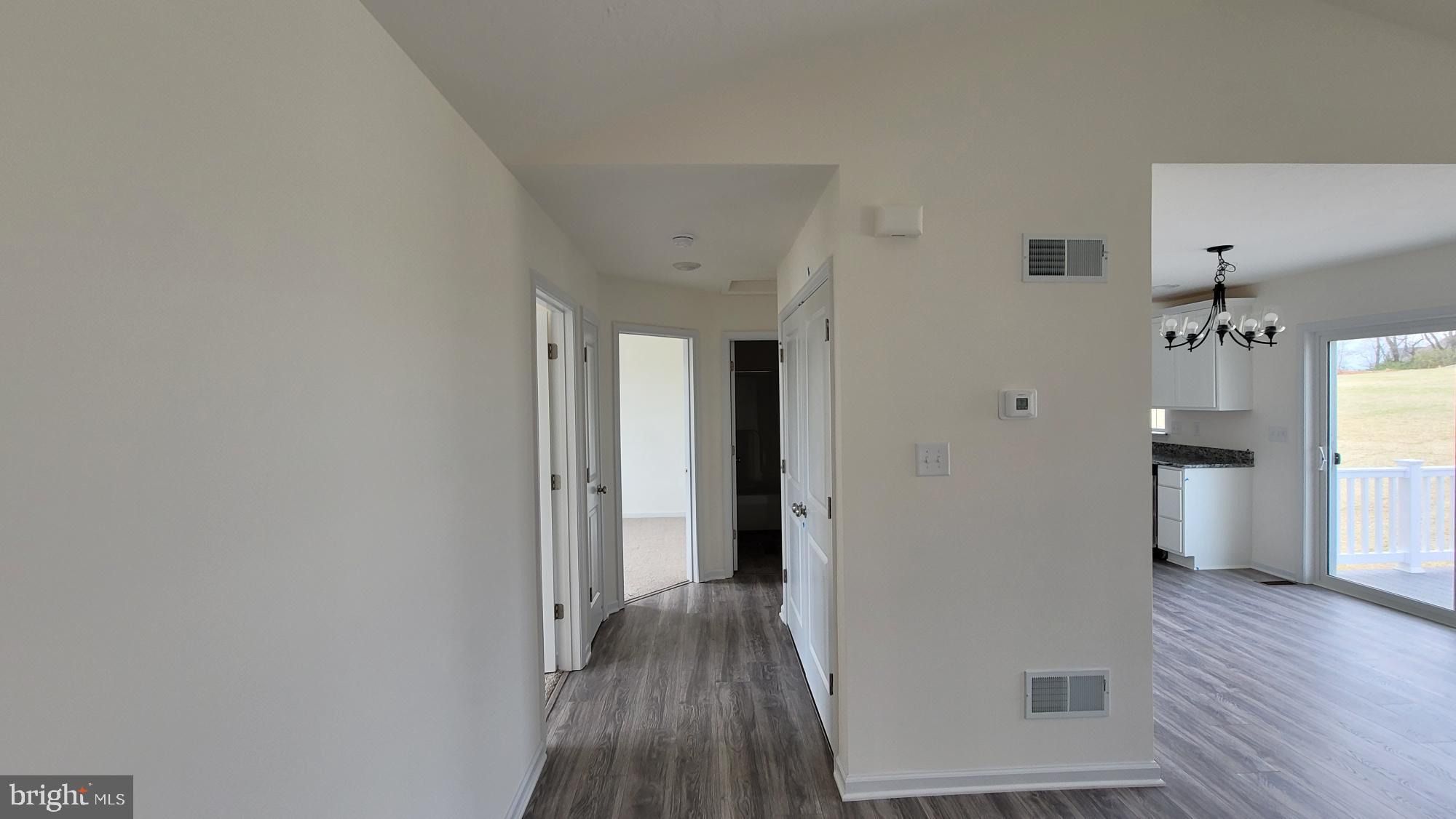 268 Ledger Drive, Unit 141 Hanover, PA 17331 - Photo 9 of 22 a view of a hallway with wooden floor