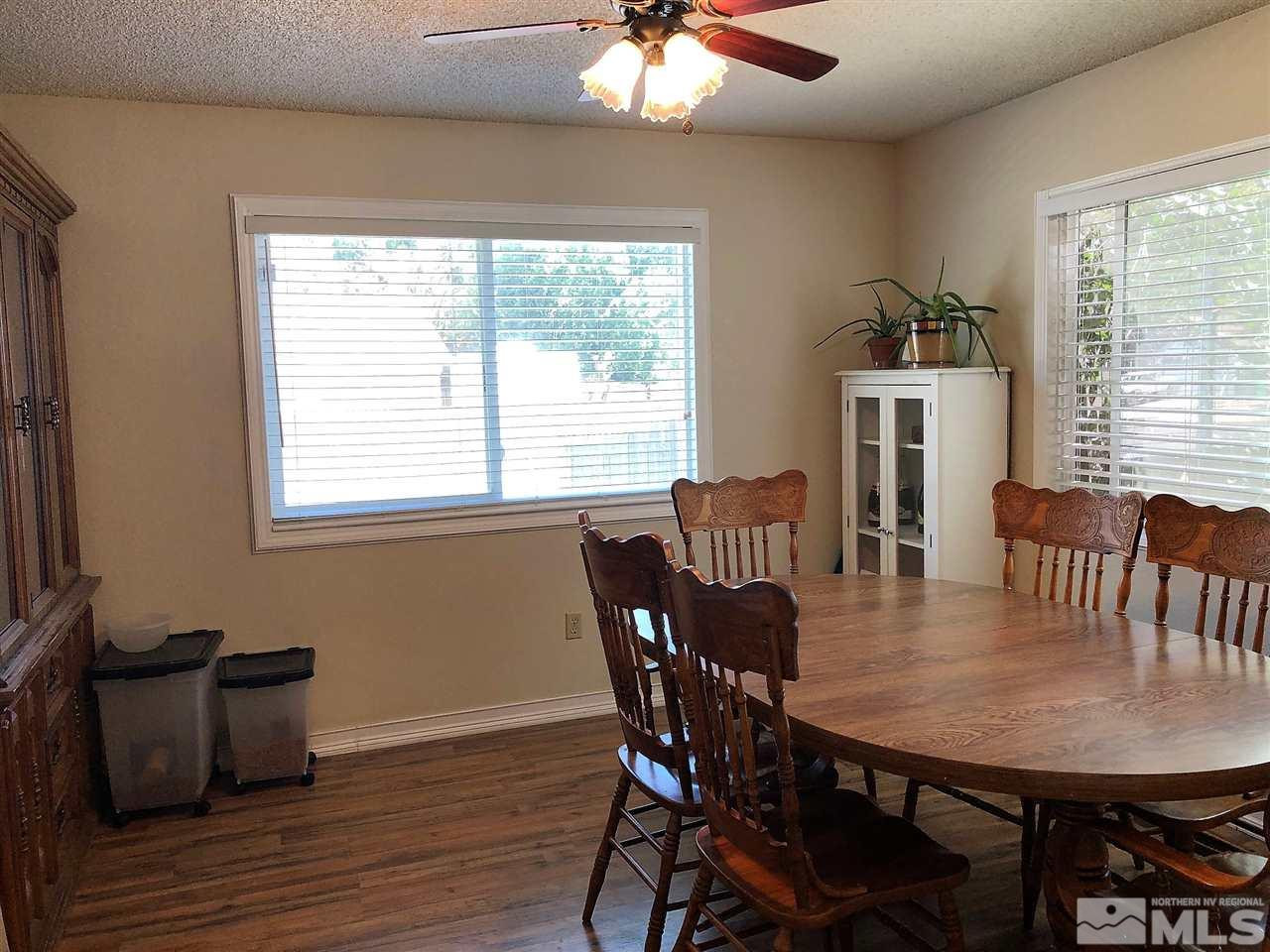 2180 Figoni Ranch Road, Unit NV Sparks, NV 89434 - Photo 12 of 39 a view of a dining room with furniture and window