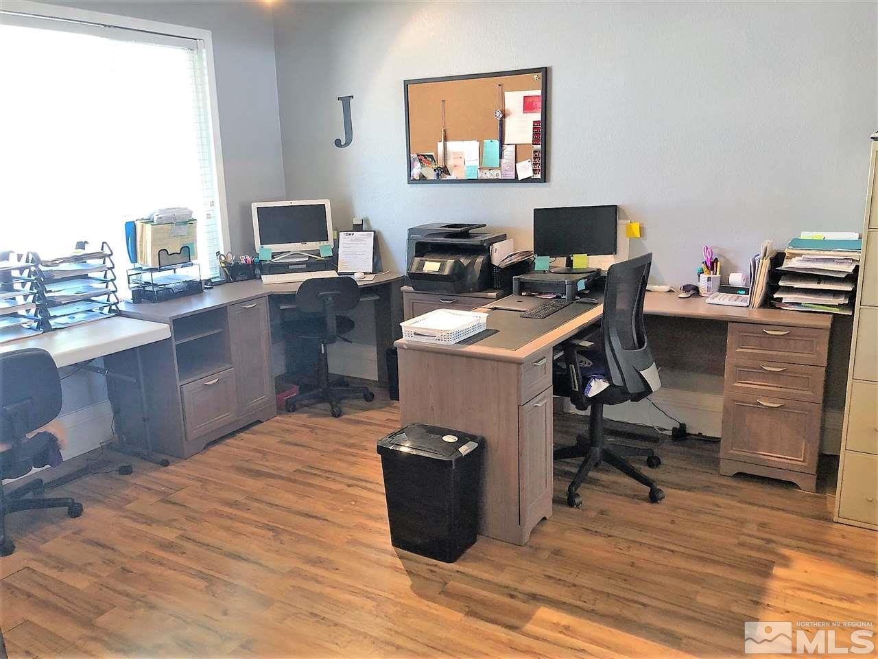 2180 Figoni Ranch Road, Unit NV Sparks, NV 89434 - Photo 13 of 39 a room with a desk and workspace