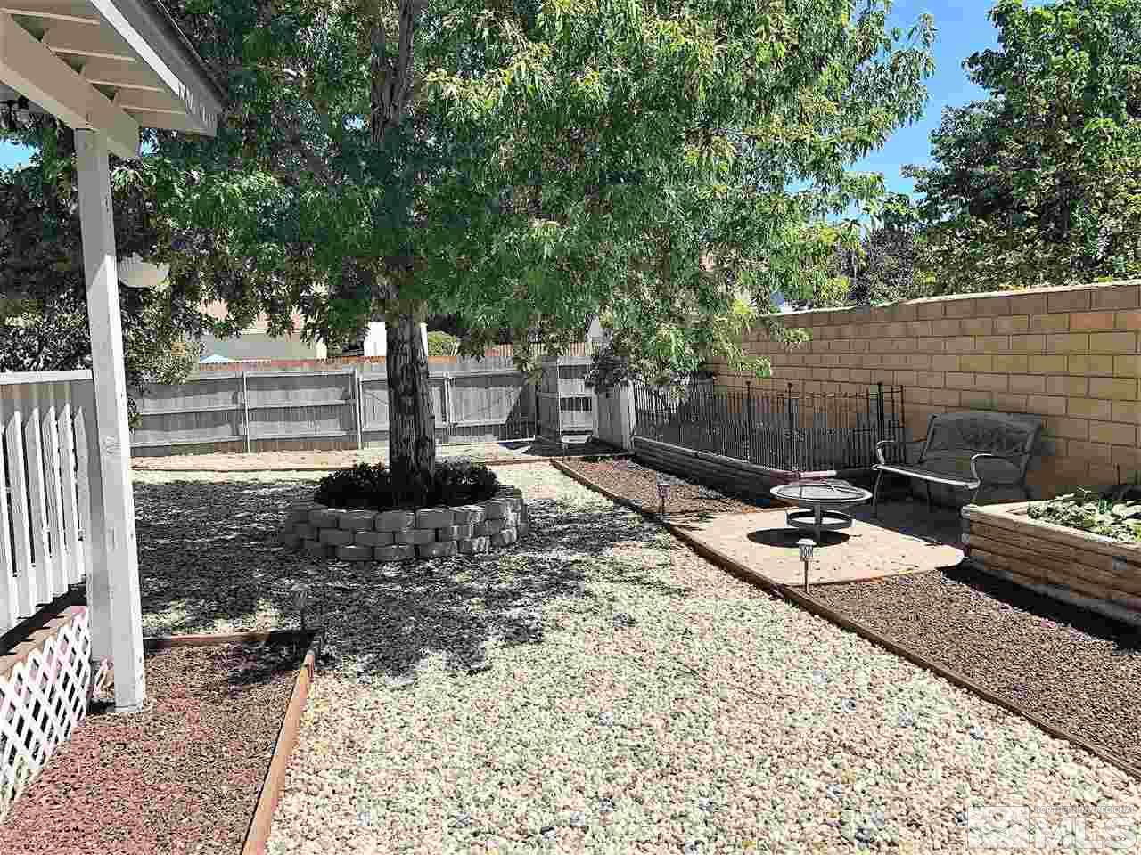 2180 Figoni Ranch Road, Unit NV Sparks, NV 89434 - Photo 29 of 39 a view of a backyard with sitting area