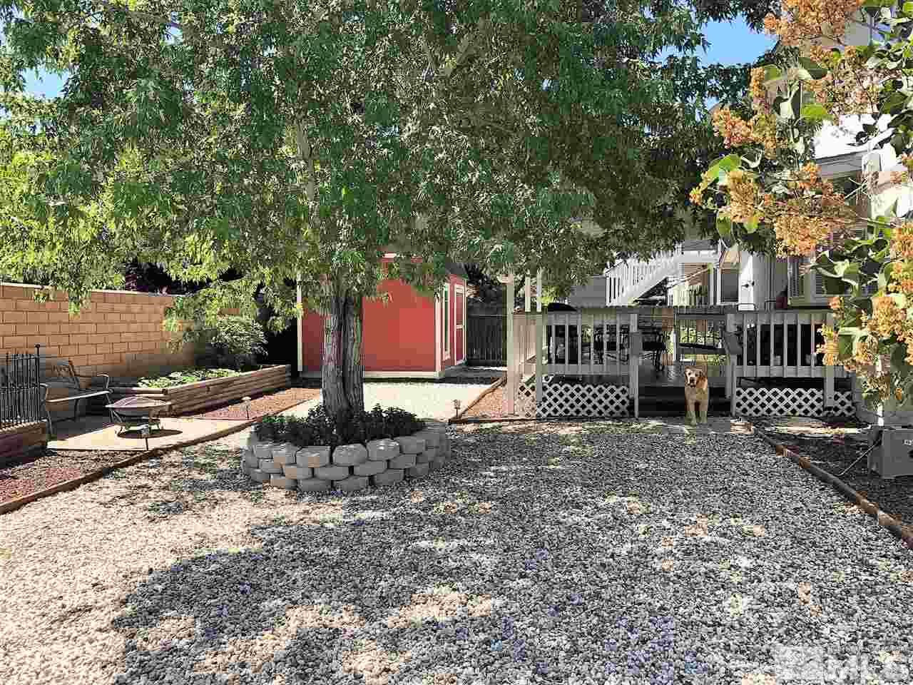2180 Figoni Ranch Road, Unit NV Sparks, NV 89434 - Photo 31 of 39 a view of a yard with plants and large trees