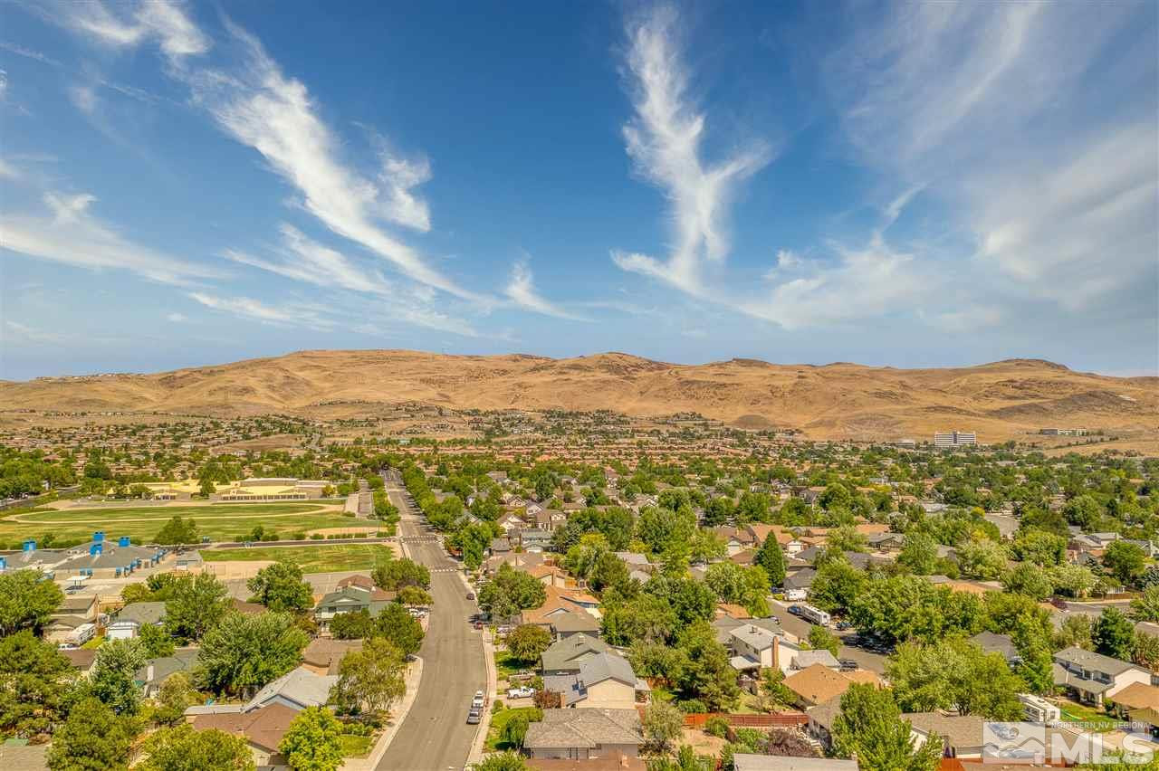 2180 Figoni Ranch Road, Unit NV Sparks, NV 89434 - Photo 37 of 39 a view of a city with mountains in the background