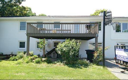 4536 Rosecrest Road Roanoke, VA 24018 - Photo 3 of 24 a view of a house with wooden deck and furniture