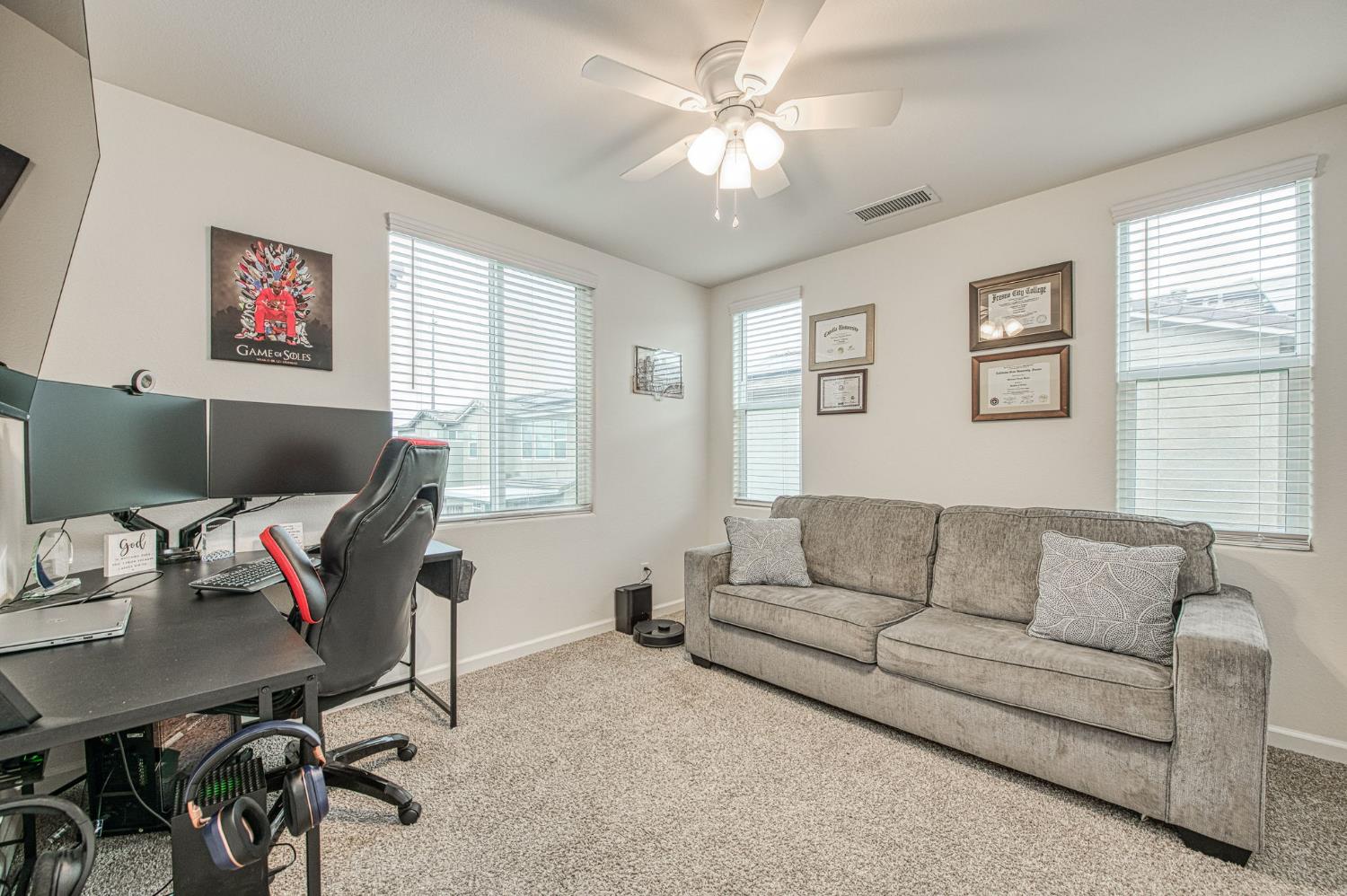 123 Capstone Way South Madera, CA 93636 - Photo 19 of 32 a living room with furniture and a flat screen tv
